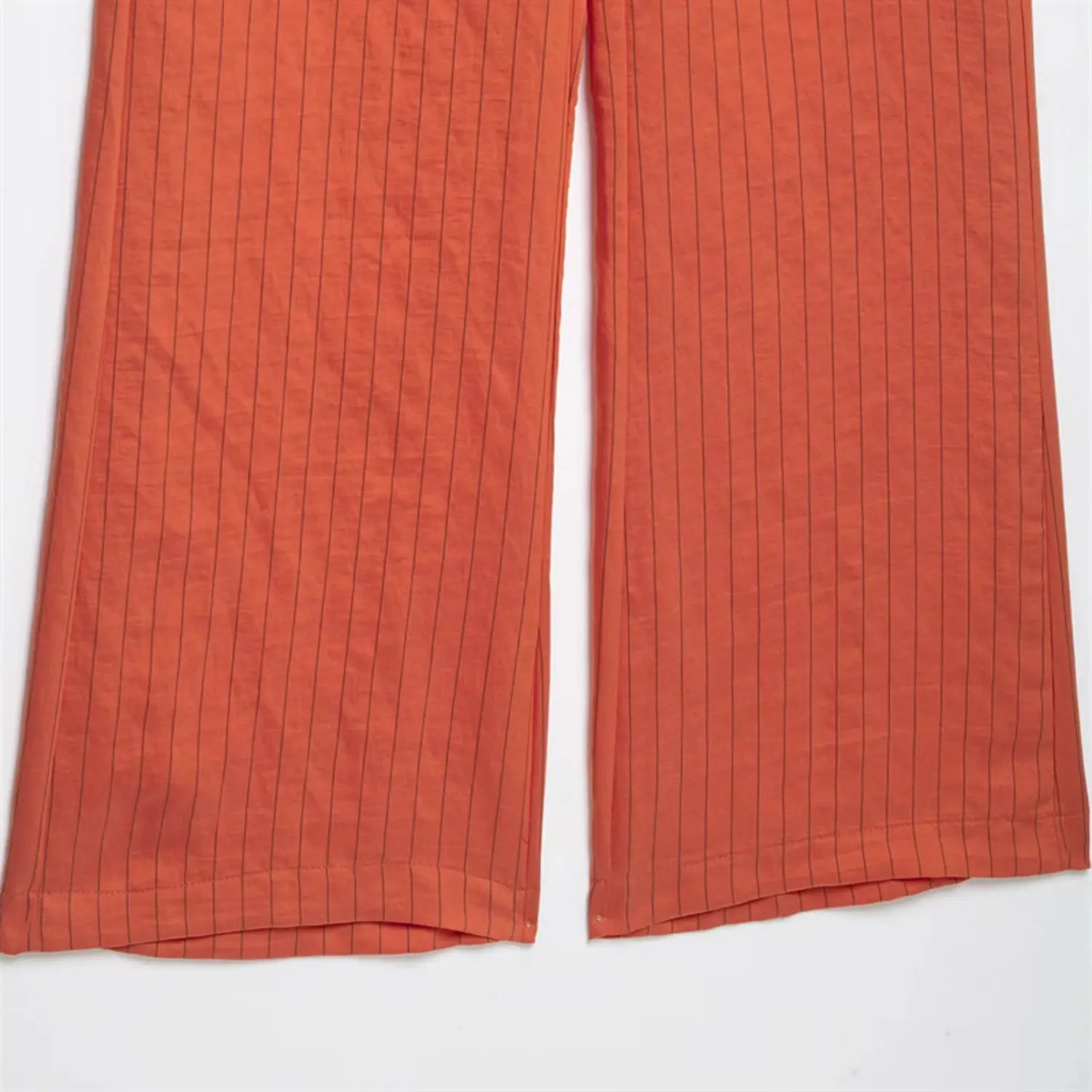 Trouser leg hem partial shot, straight wide leg edge, folded double binding hem, uniform thin vertical stripe print