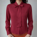 Women wearing wine red satin bow tie blouse daily outfit