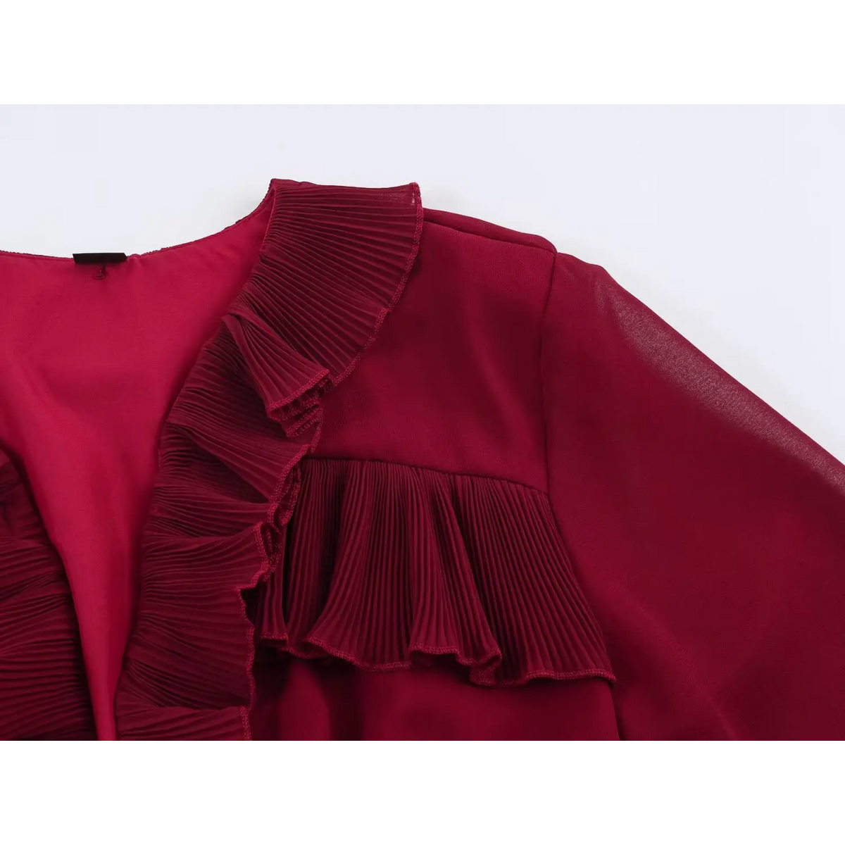 Close-up of layered ruffle neckline and chest area of wine red maxi dress with black size label