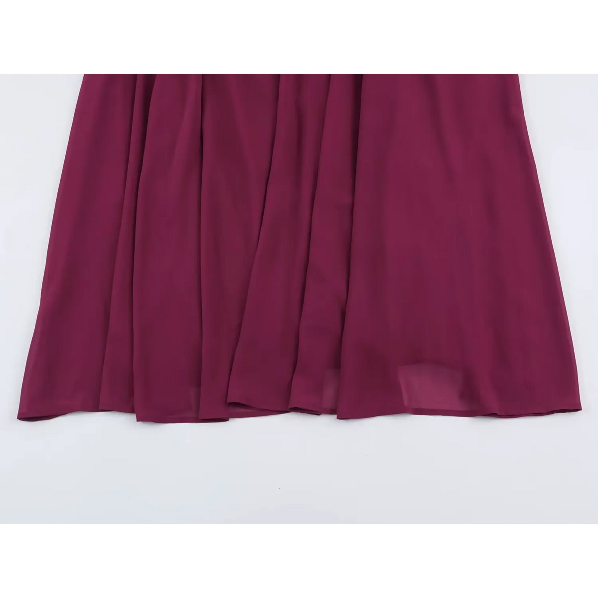 Close-up of flowing wine red chiffon maxi skirt with natural drape