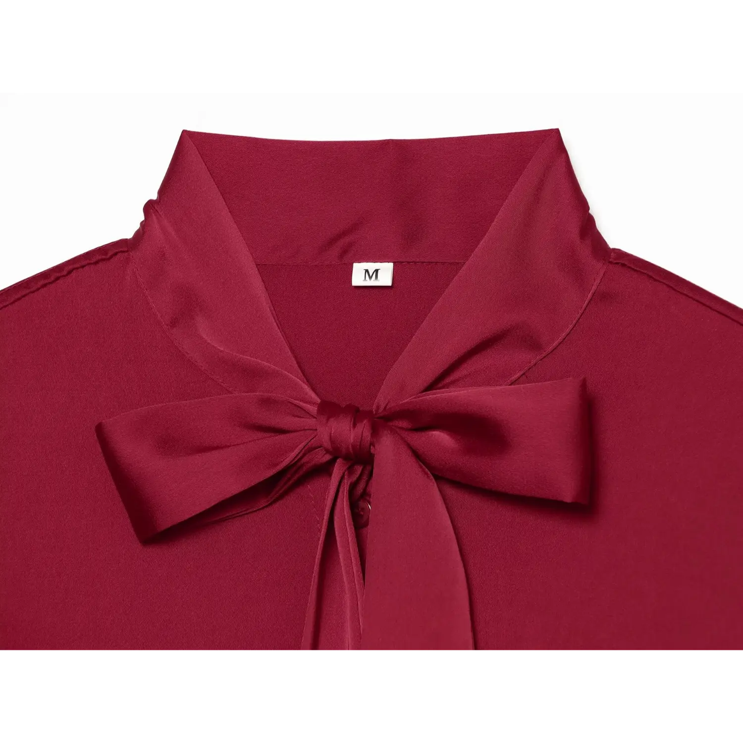 Detailed shot of large fabric bow on wine red stand collar shirt