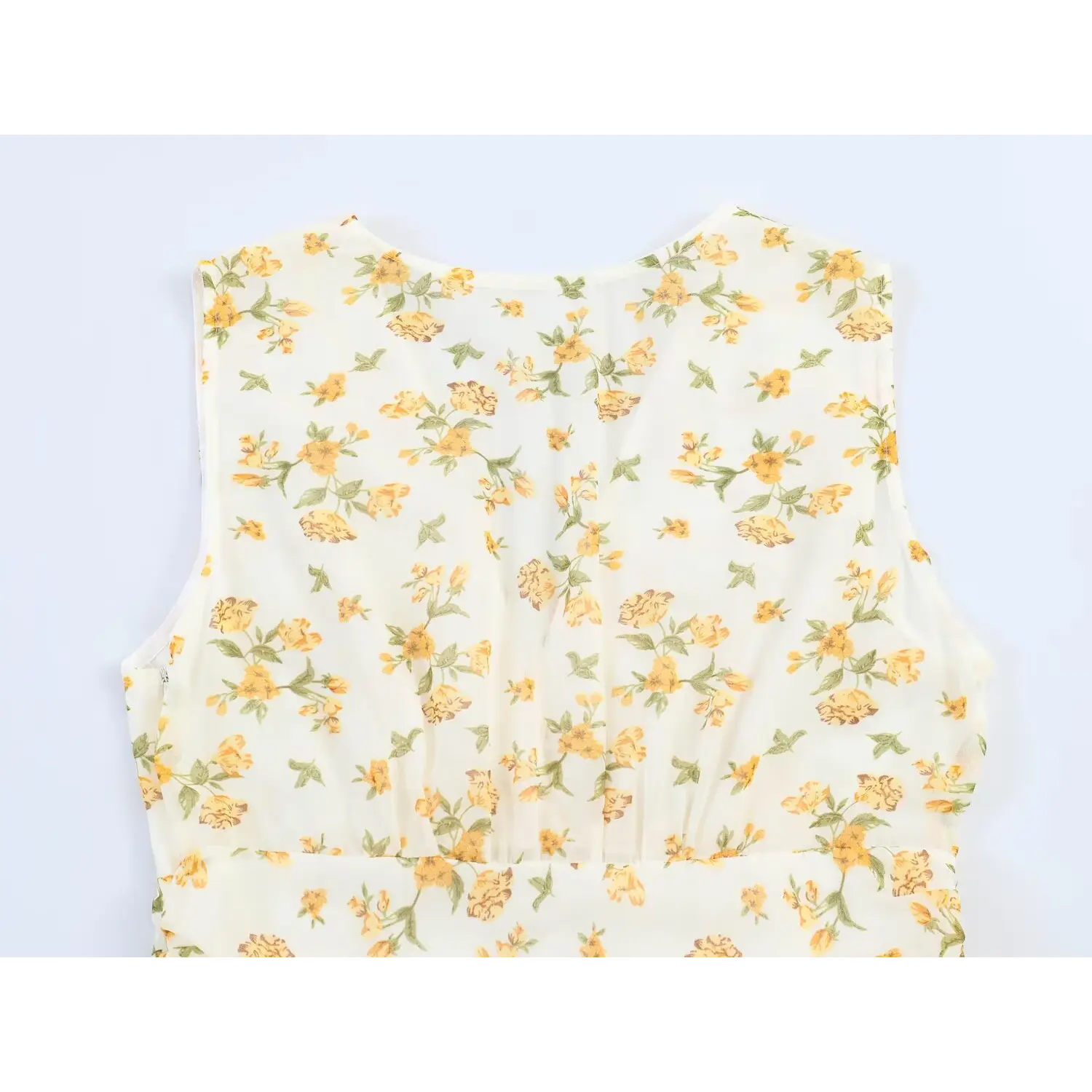 Flat lay back torso view sleeveless yellow floral chiffon mini dress