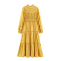 Full look of yellow ruffle collar maxi dress with puff sleeves and tiered shirred skirt