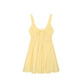 Full front flat shot of yellow cami mini dress, tie front detail, smocked elastic waist, adjustable spaghetti straps