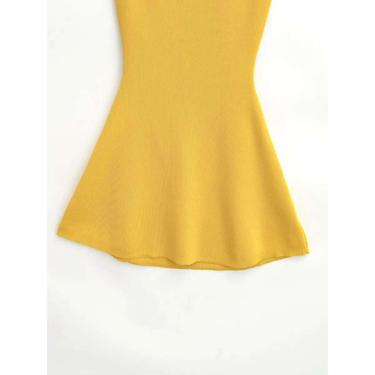 Full shot of the flared skirt, showing the A-line silhouette and finished hem of the yellow knit dress.