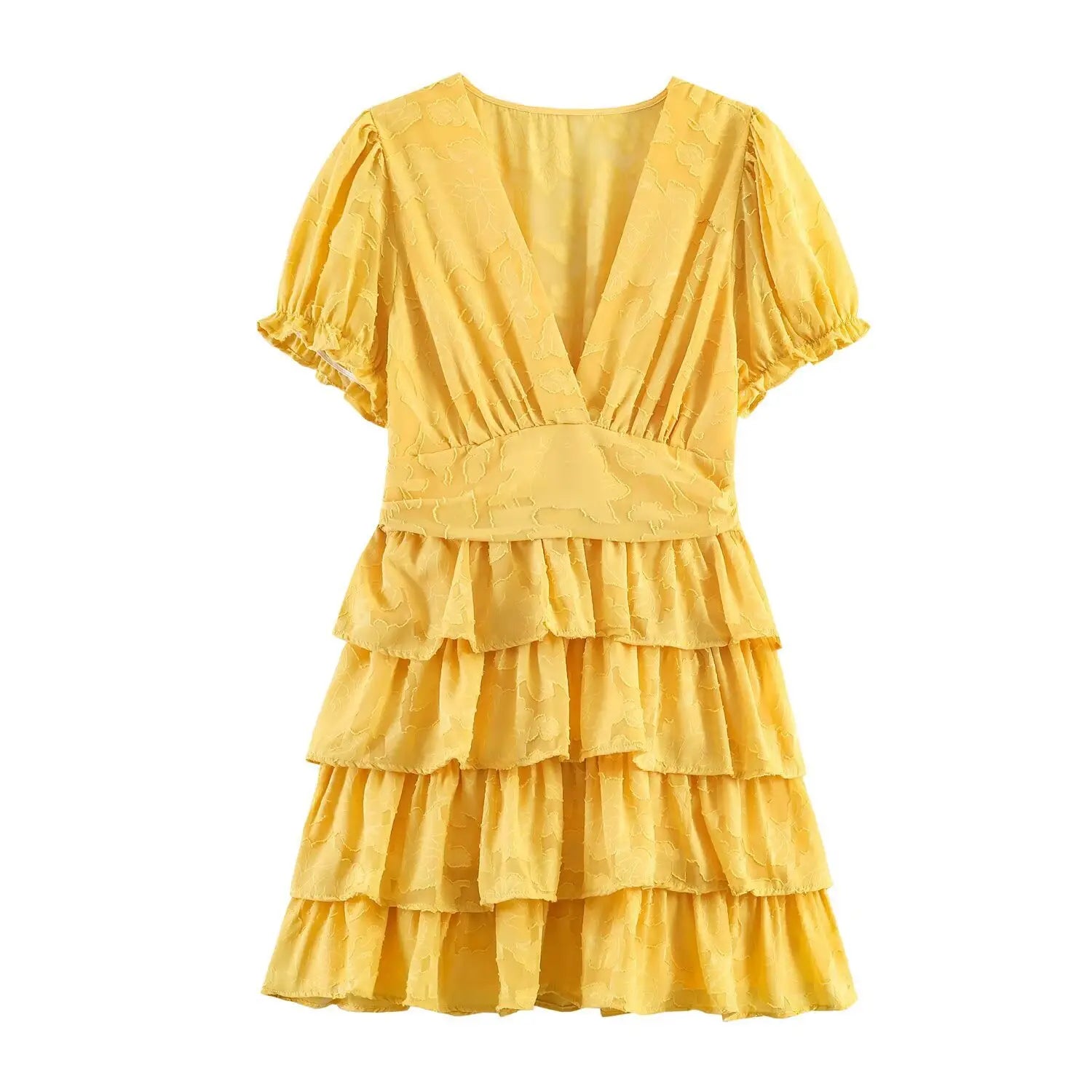 Front view of the yellow textured floral dress, showing the deep V-neck and tiered ruffle skirt