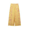Back product shot golden yellow floral wide leg trousers with back welt pockets