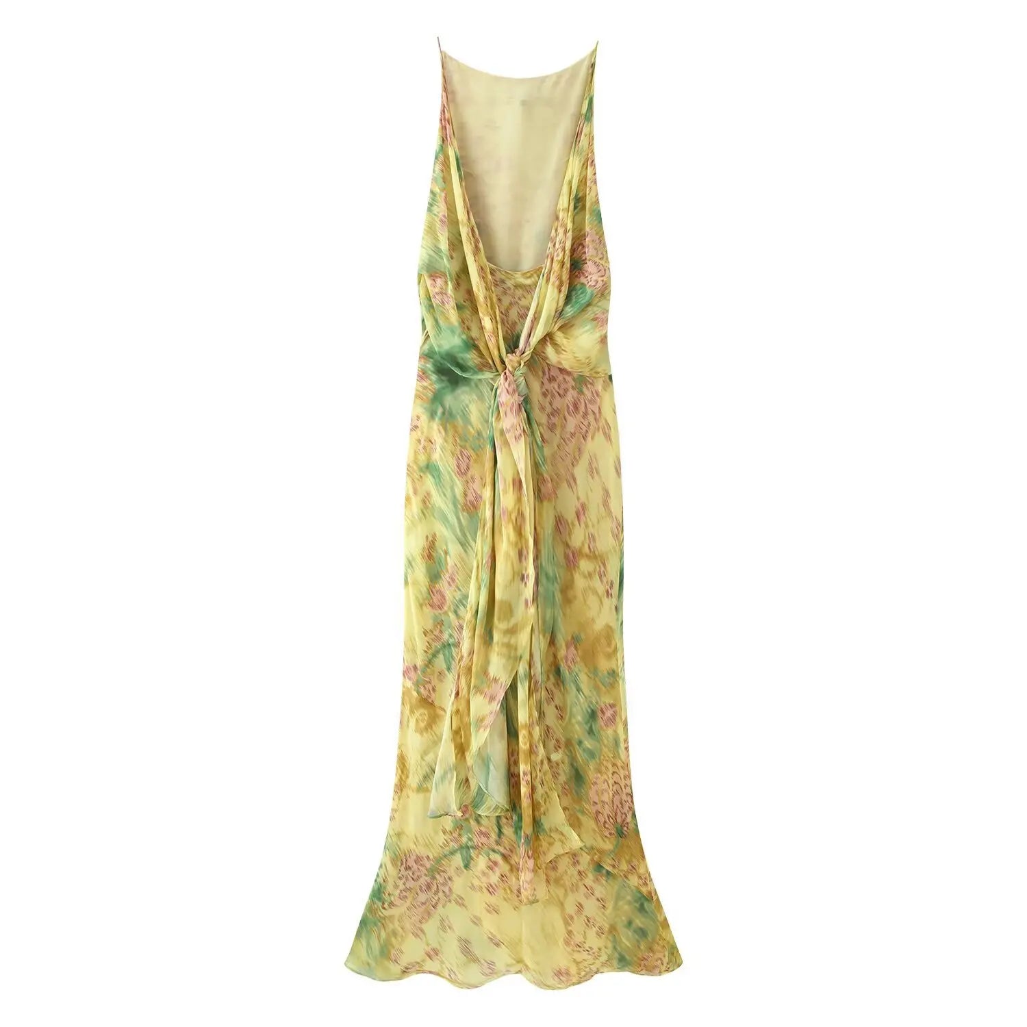 Full back flat lay maxi dress, pale yellow base watercolor pink green floral print, ultra thin matching print spaghetti straps, center back self fabric twist knot cutout, flowy chiffon two layer midi maxi skirt