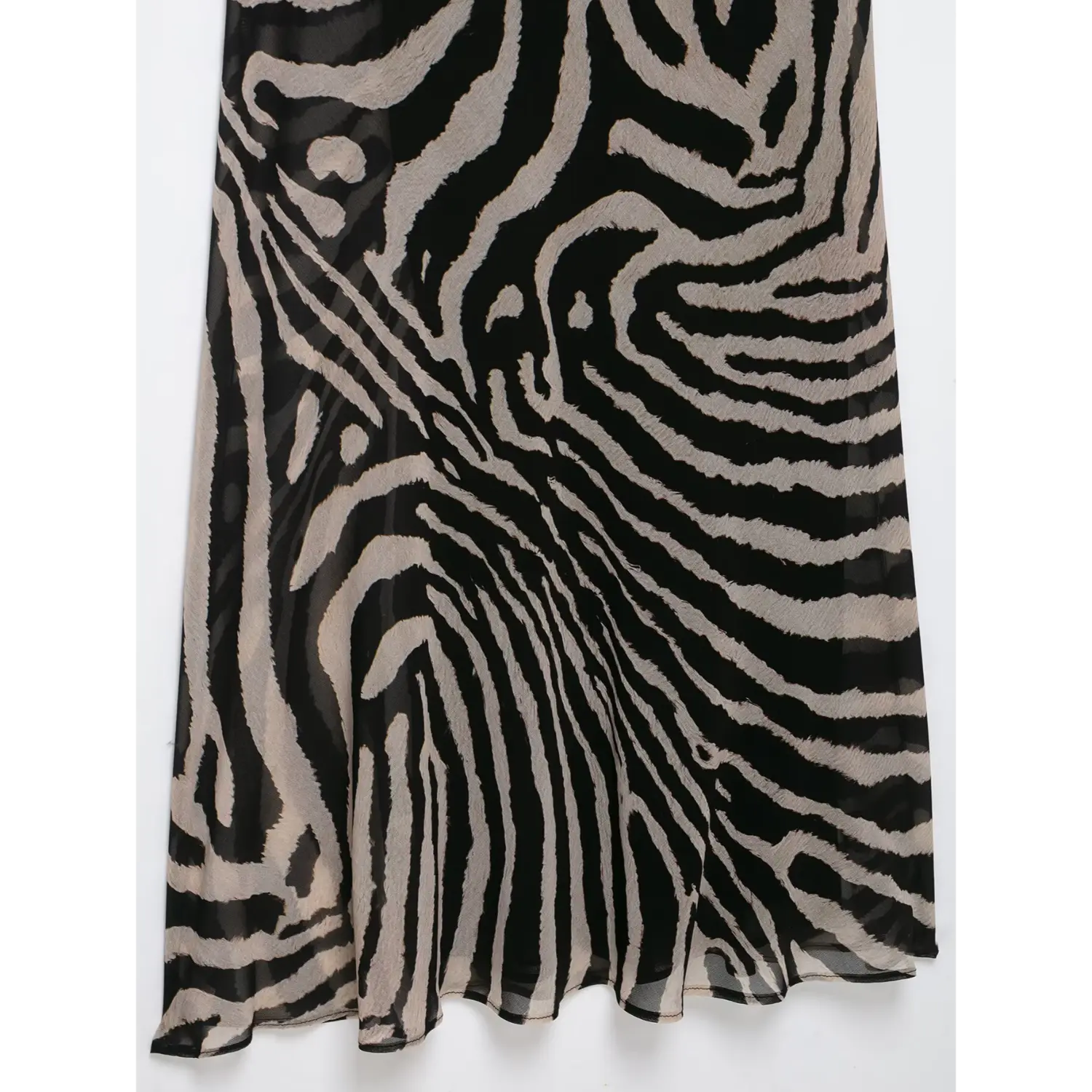 Close‑up skirt panel and zebra pattern print on sheer mesh halter maxi dress