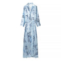 Front flat lay of zebra print lace trim satin maxi shirt dress