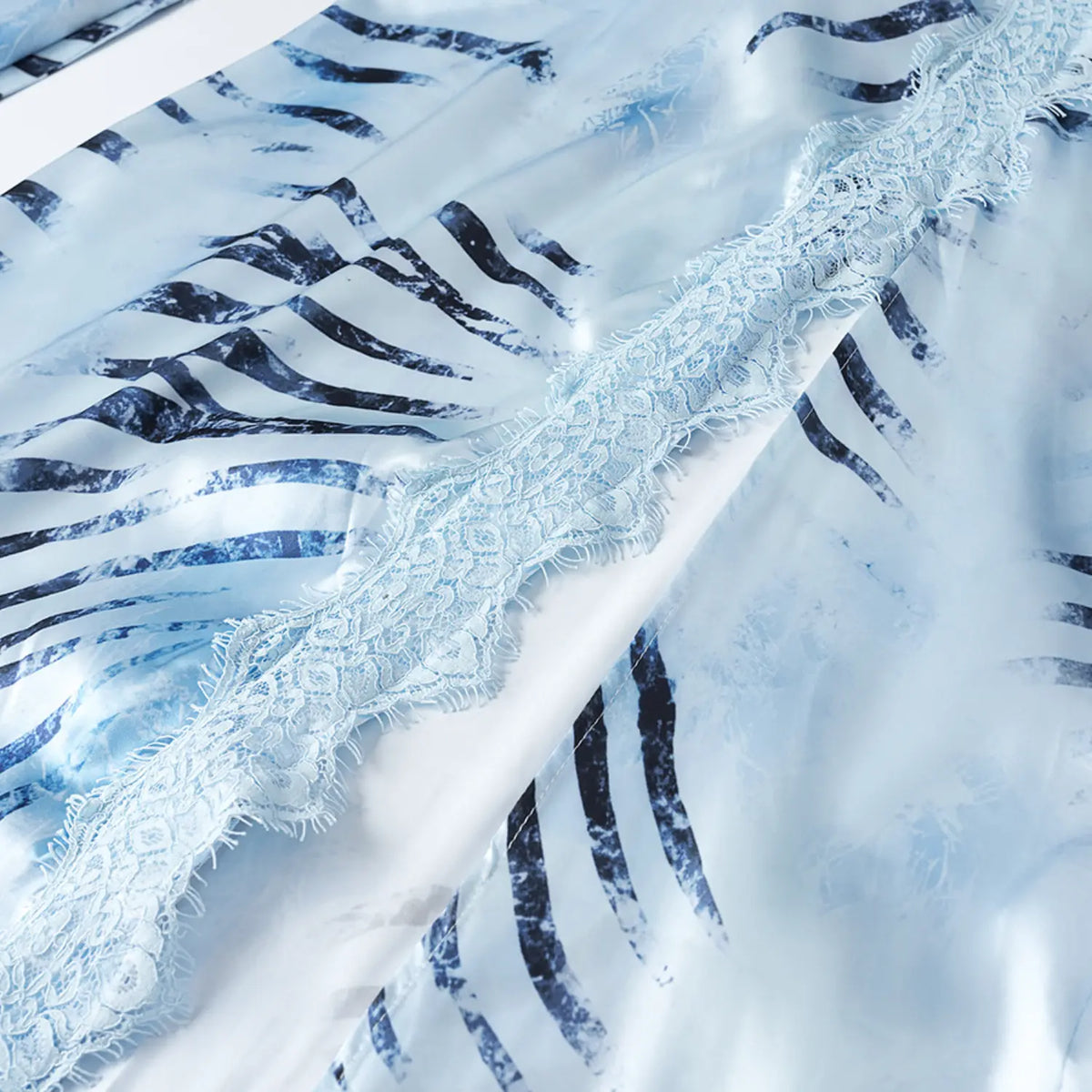 Close-up of front slit lace trim